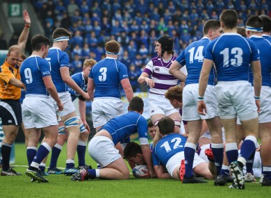 David Jeffares goes over for Clongowes' first try.