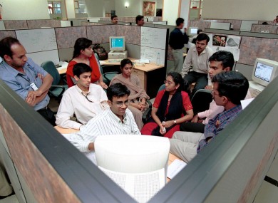 Professionals at a training session in Infosys in Bangalore - India is a training ground for one of the world's largest technology work forces.