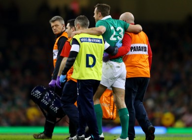 Bowe hobbles off during Friday night's defeat in Cardiff.