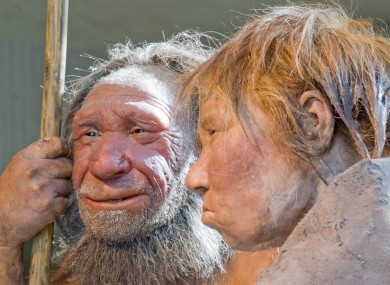 Reconstructions of a Neanderthal man and woman.