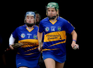 The Tipperary team take to the field led by Cáit Devane.