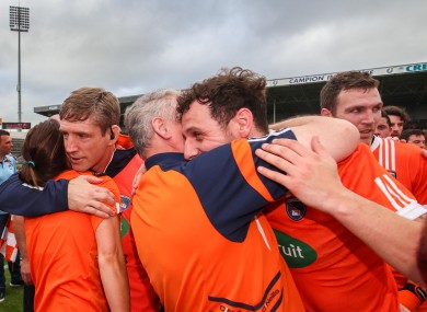Armagh players and management celebrate the win over Tipperary.