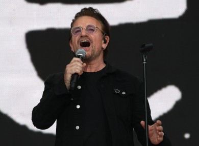 There's Bono now, singing in Canada.