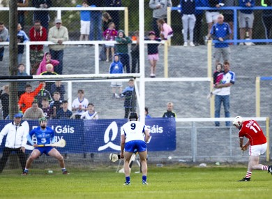 Declan Dalton fires a late penalty to the net for Cork.