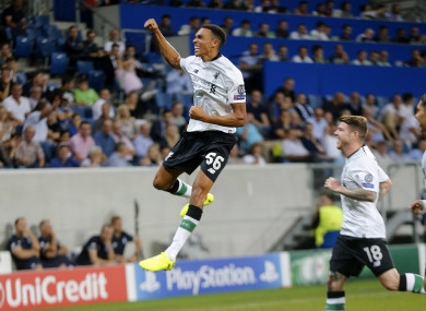 Liverpool's Trent Alexander-Arnold, left, celebrates his side's opening goal.