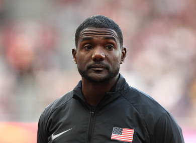 Justin Gatlin of the USA (gold) at the victory ceremony after the men's 100 m final at the IAAF World Championships in Athletics at the Olympic Stadium in London.