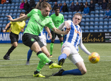 Forrest on fire: Iain Wilson tries to block Celtic man.
