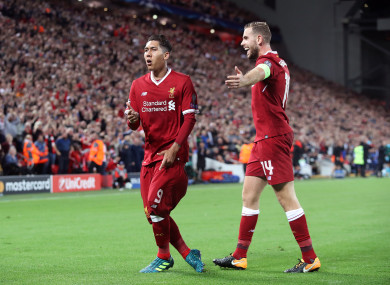 Liverpool's Roberto Firmino celebrates scoring his side's fourth goal.