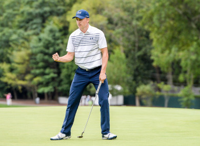 Jordan Spieth celebrates a birdie putt to tie the lead at 6 under on to the 16th hole during the second round of The Northern Trust golf tournament at Glen Oaks Club.