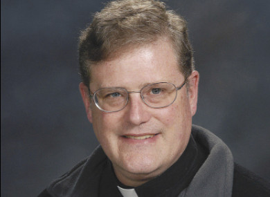 In this photo provided by the Catholic Diocese of Arlington, Va., is Father William Aitcheson, a priest in the Roman Catholic Diocese of Arlington.