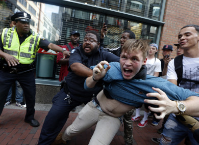A counter-protester, part of a small group who remained on the street hours after a