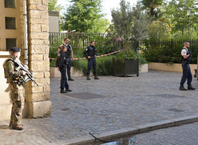 Police work near the scene where French soldiers were hit and injured by a vehicle.