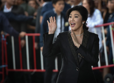 Former Thai Prime Minister Yingluck Shinawatra waves to supporters as she arrives at the Thai Supreme Court at the start of this month.