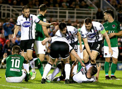 The Dundalk players with goalscorer Robbie Benson after his leveller.