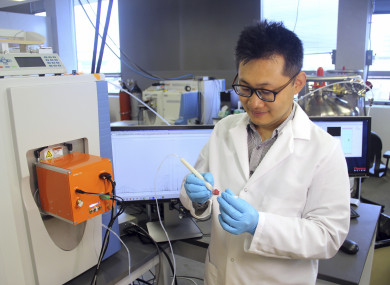 Scientist Jialing Zhang using the tool