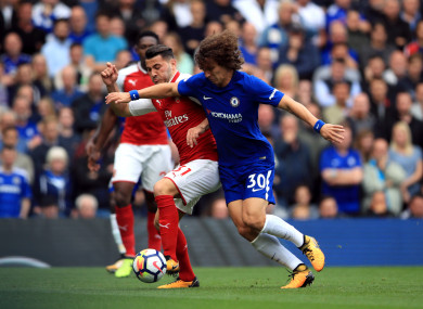Chelsea's David Luiz (right) and Arsenal's Sead Kolasinac battle for the ball.