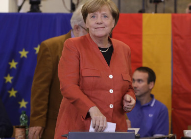 German Chancellor Angela Merkel casts her vote in Berlin.