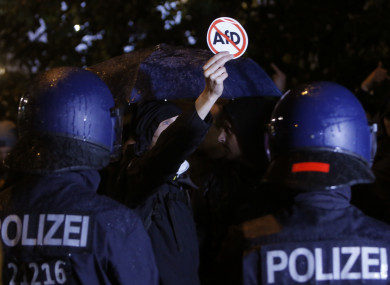 Police block demonstrators protesting against the nationalist 'Alternative for Germany', AfD, party in Berlin yesterday
