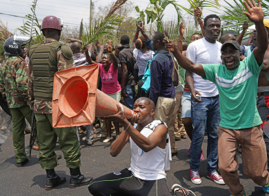 Supporters of opposition candidate Raila Odinga celebrate the result