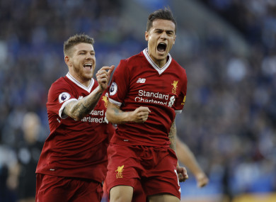 Coutinho celebrates his stunning free-kick.