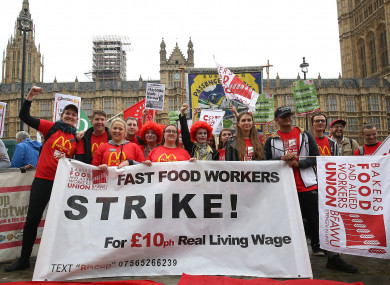 Supporters and workers from McDonald's restaurants in Cambridge and Crayford, SE London, during a rally at Old Palace Yard, London today.