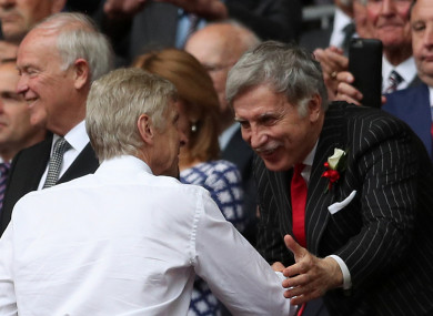 File photo dated 27-05-2017 of Arsenal manager Arsene Wenger shaking hands with Owner Stan Kroenke.