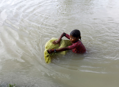 A child swimming across the border into Bangladesh