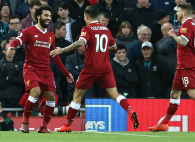 Mohamed Salah (L) celebrates with Liverpool team-mates