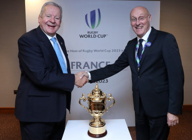 World Rugby Chairman Bill Beaumont shakes hands with Bernard Laporte, FFR President.