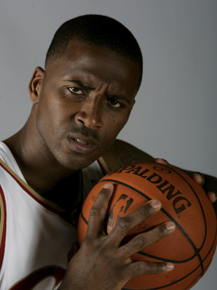 File photo of Lorenzen Wright posing at the NBA basketball team's media day in Independence, Ohio.
