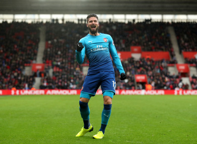 Giroud celebrates his late leveller.