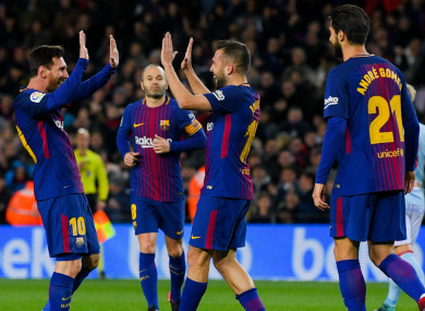 Messi leads celebrations with Jordi Alba.