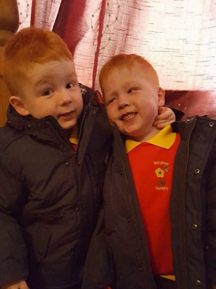 Kayden (right) with his twin brother Jayden