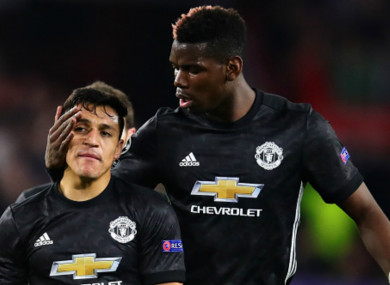 Paul Pogba and Manchester United team-mate Alexis Sanchez (L)