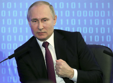 Russian President Vladimir Putin gestures while speaking during a meeting of the Russia's Union of Industrialists and Entrepreneurs.