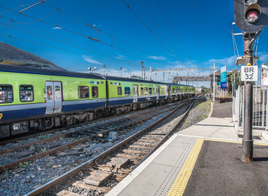 A DART picking up passengers at Bray Daly railway station.