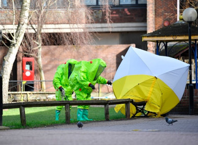 Members of the emergency services in green biohazard encapsulated suits following the attack on Sergei Skripal.