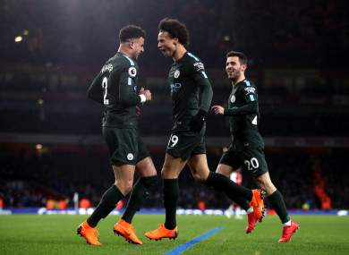 Manchester City's Leroy Sane (centre) celebrates scoring a goal.