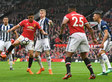 McClean (centre) with Alexis Sanchez at Old Trafford yesterday.