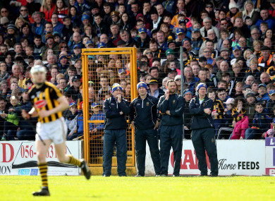 The Tipperary management watch on during yesterday's clash with Kilkenny.