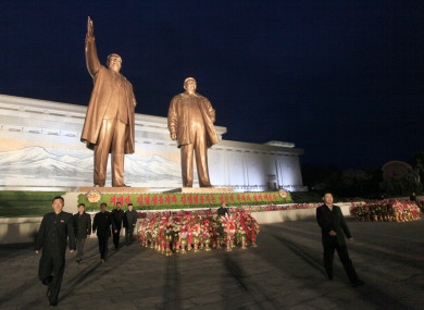 North Koreans visit the Mansu Hill to lay floral baskets and flowers to the statues of late leaders Kim Il-Sung and Kim Jong-Il