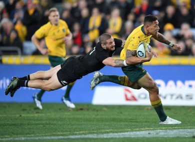 Perenara tackles Folau during the Bledisloe Cup last year.