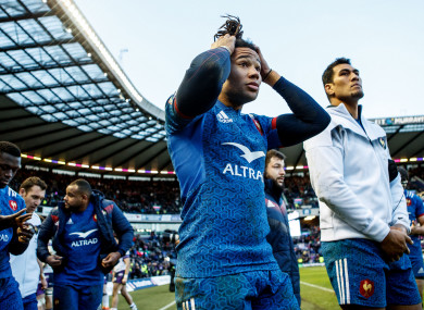 Teddy Thomas reacts after France's defeat to Scotland.