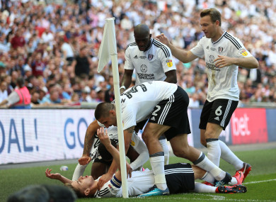 Fulham's Tom Cairney celebrates scoring.
