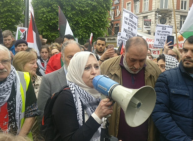 Chairperson of the Ireland-Palestinian Solidarity Campaign Fatin Al Tamimi addresses the crowd on O'Connell Street in Dublin today.