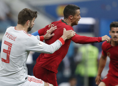 Gerard Pique challenges Cristiano Ronaldo.
