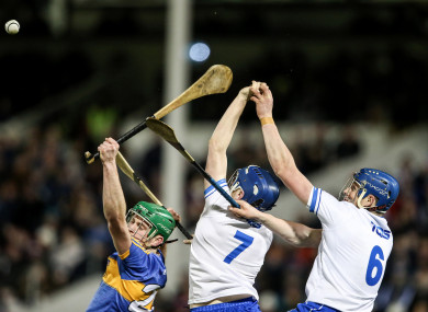 Paul Shanahan under pressure from Kieran Bennett and Austin Gleeson when the teams met in the League in February.