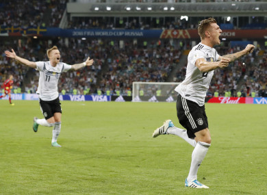 Goalscorer Kroos and Marco Reus after the winner.