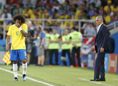 The full-back is distraught as he leaves the field.
