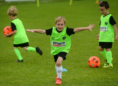 Taking the lead at the FAI Summer Soccer School.